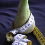 pear with tape measure, portrait